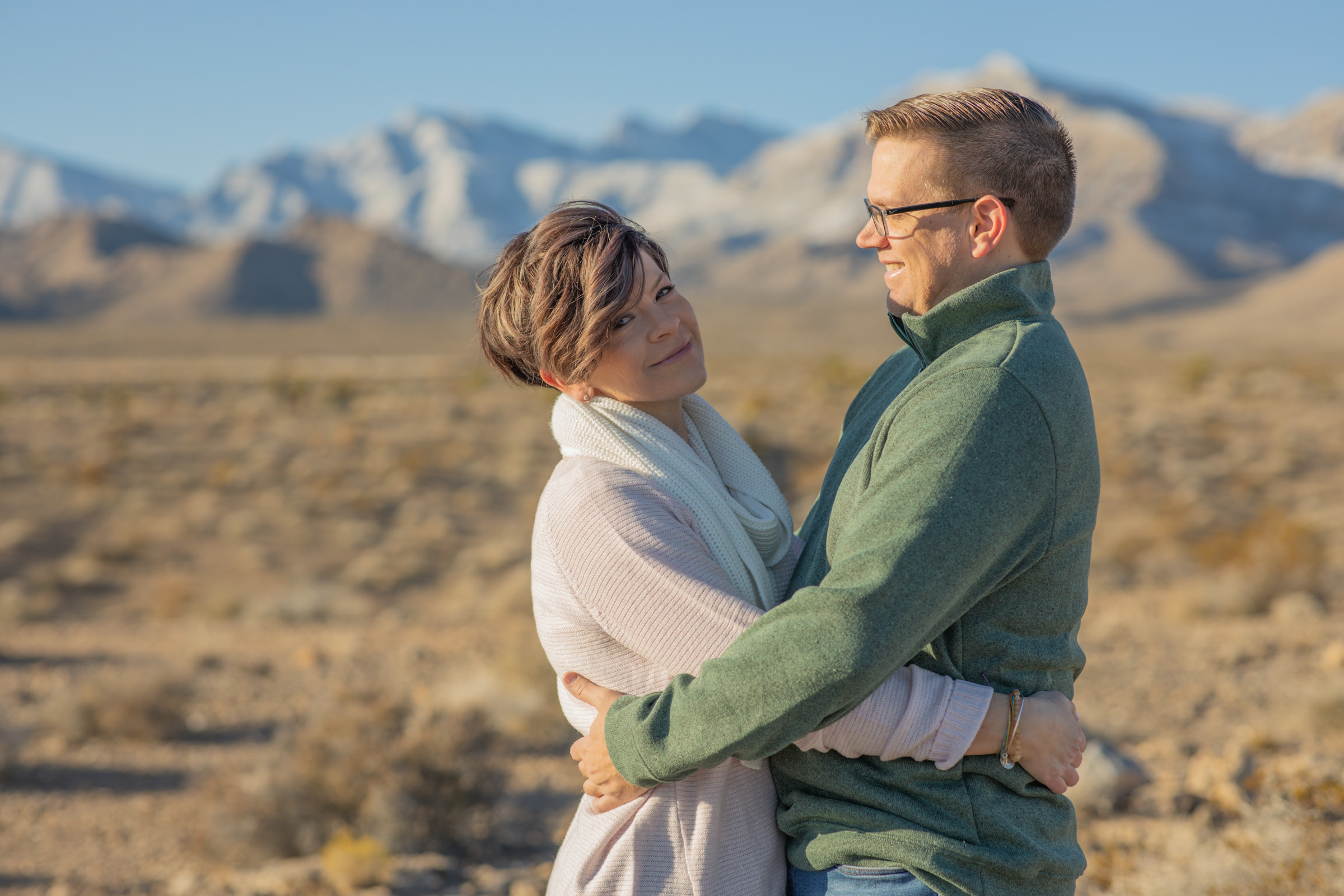 Las Vegas couples photographer, couple embracing in the open desert at Kyle Canyon