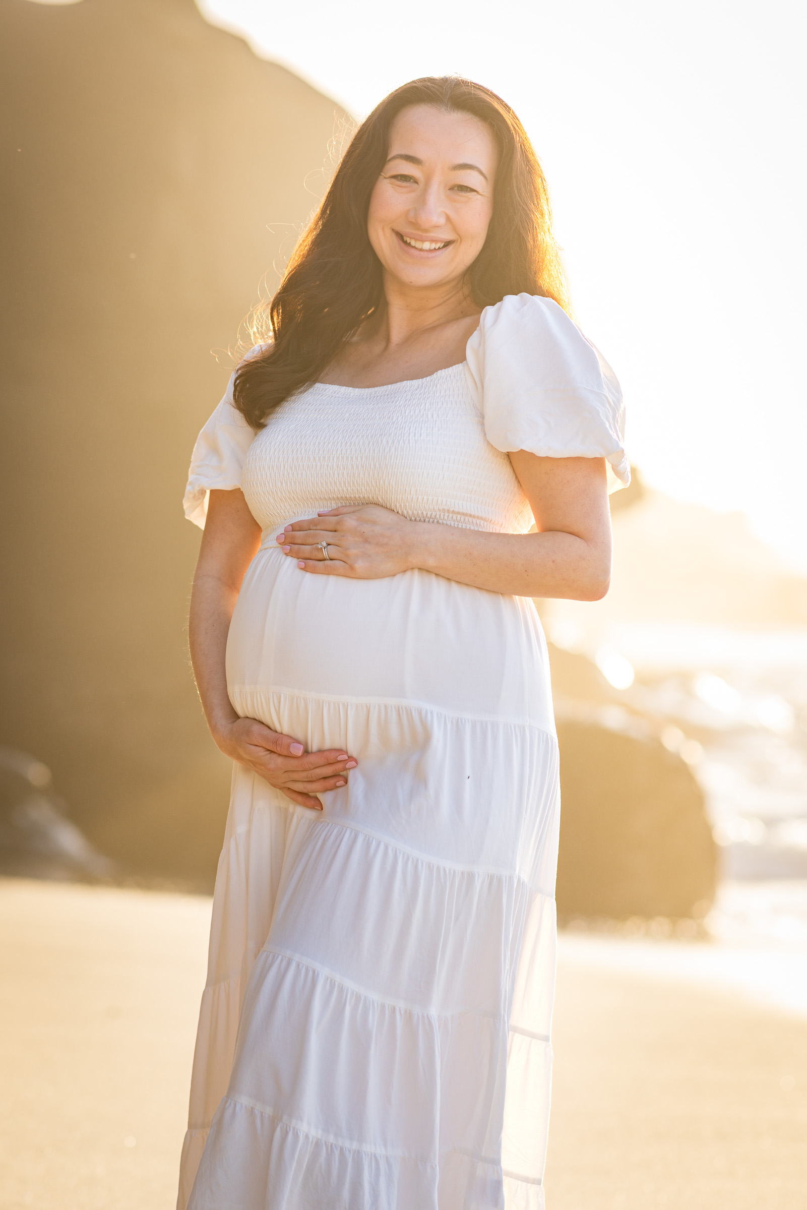 Maternity portrait on the sand at La Jolla, San Diego