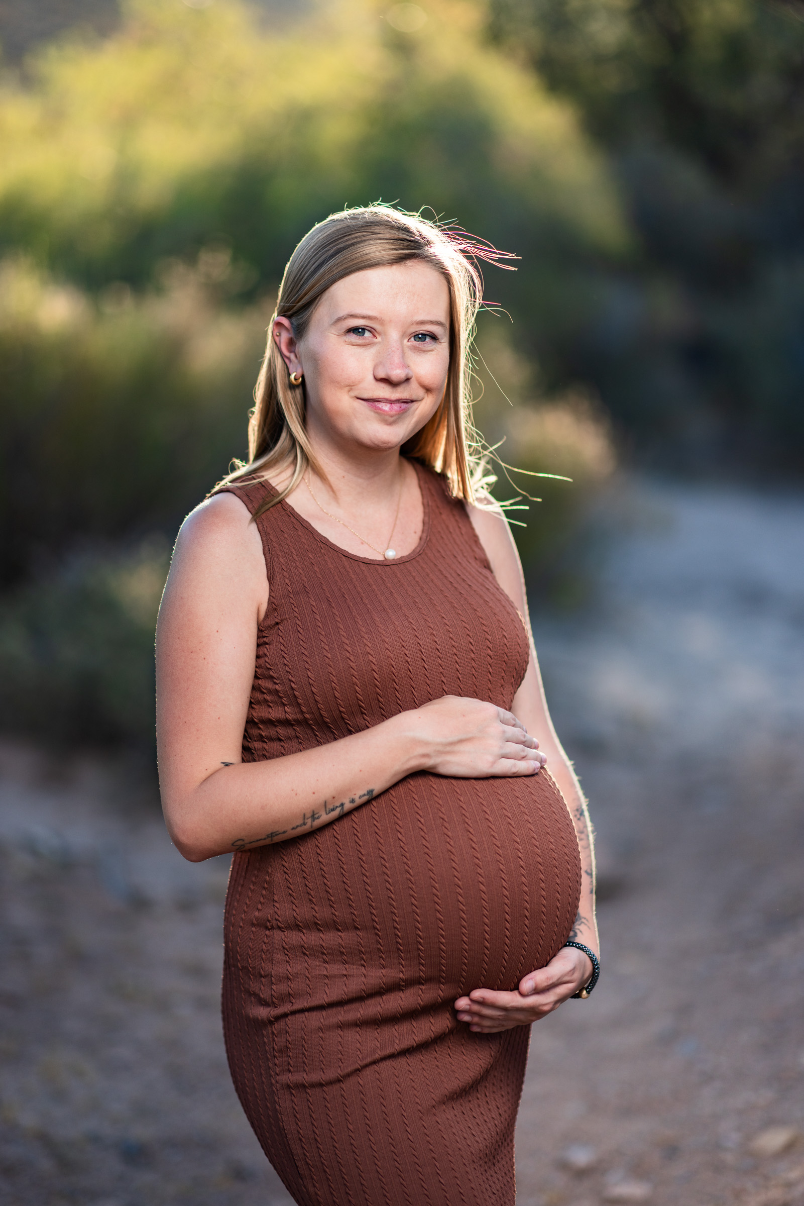 Maternity portrait in warm evening light at Red Rock Canyon near Las Vegas