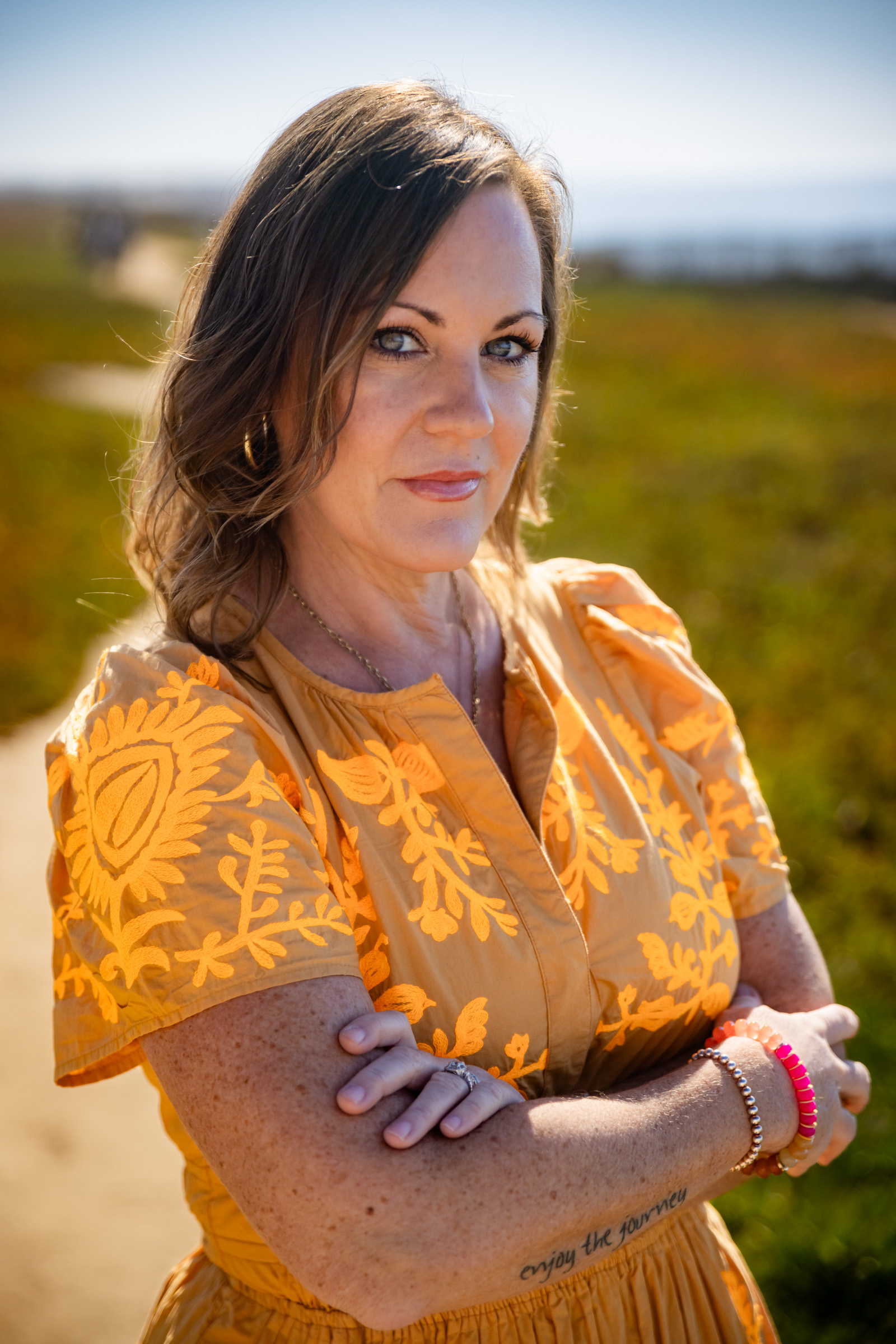 Portrait of a woman photographed on the coastal bluff in Carlsbad, San Diego County