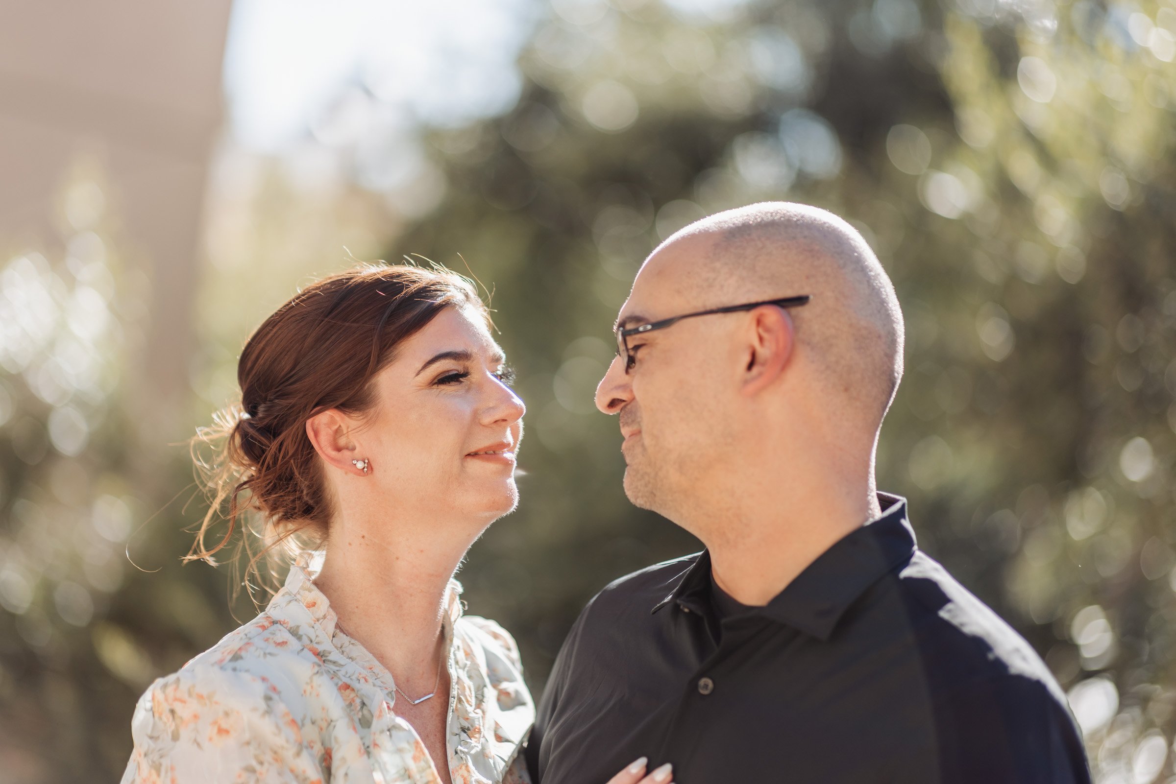 Couple laughing together during a Las Vegas Strip couples photo session