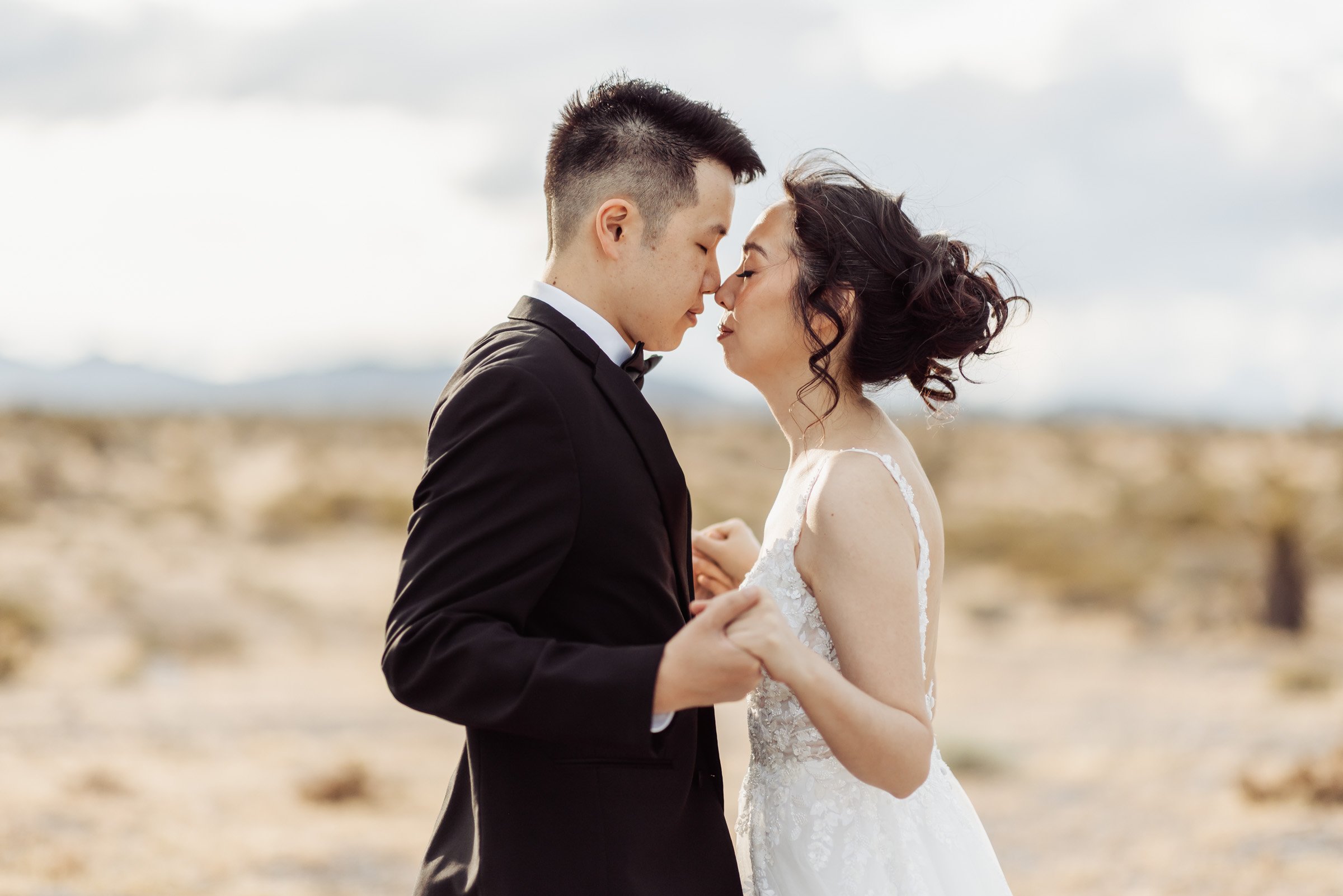 Couple photographed on a mountain road at sunset in Kyle Canyon near Mount Charleston