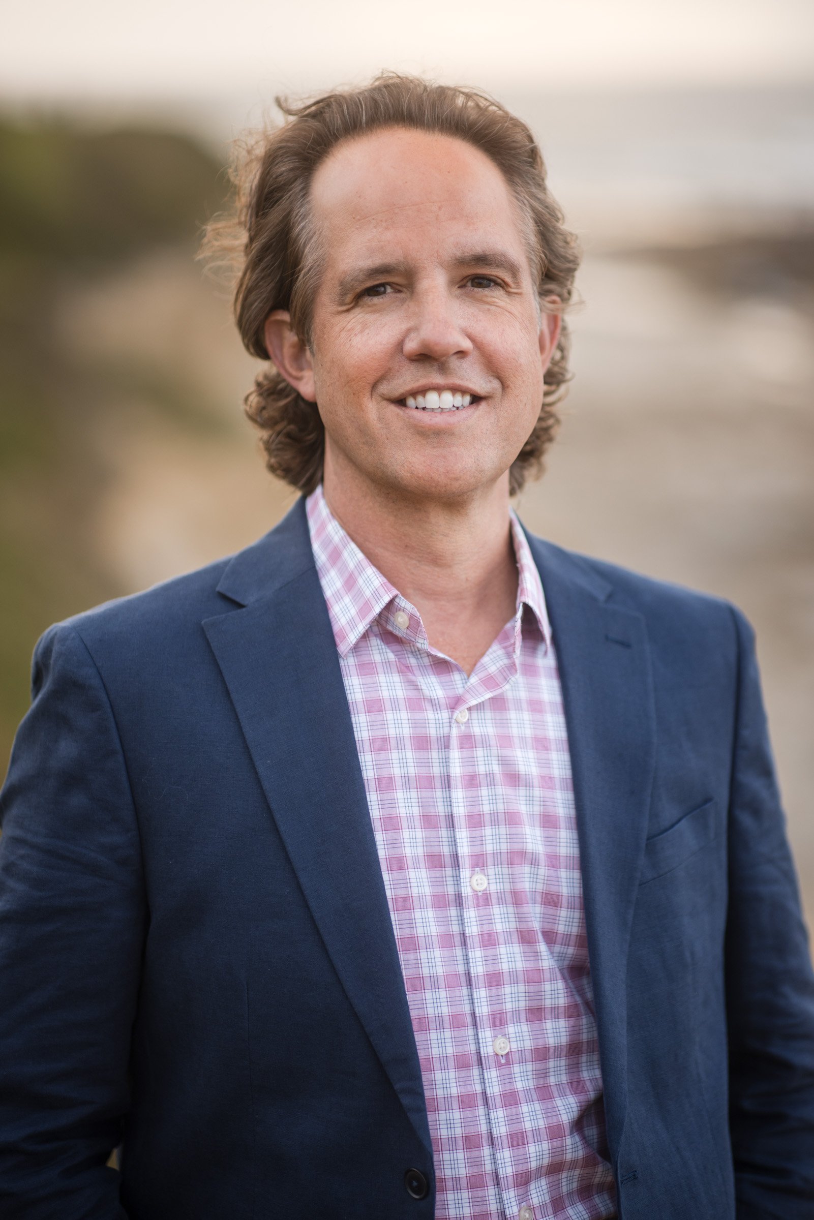 Professional headshot photographed outdoors near La Jolla Cove in San Diego